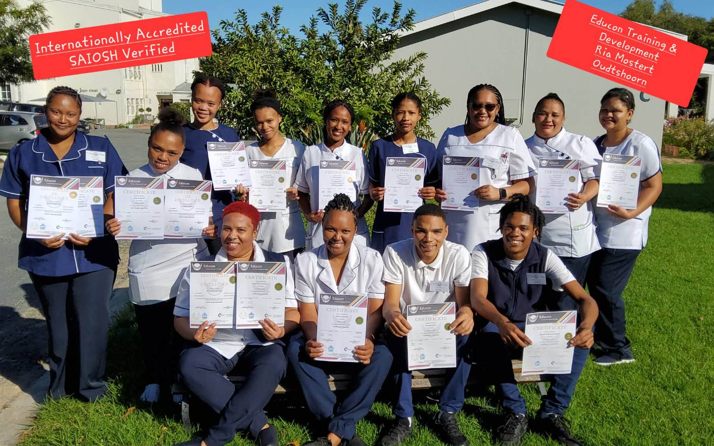 Graduating class celebrating with certificates