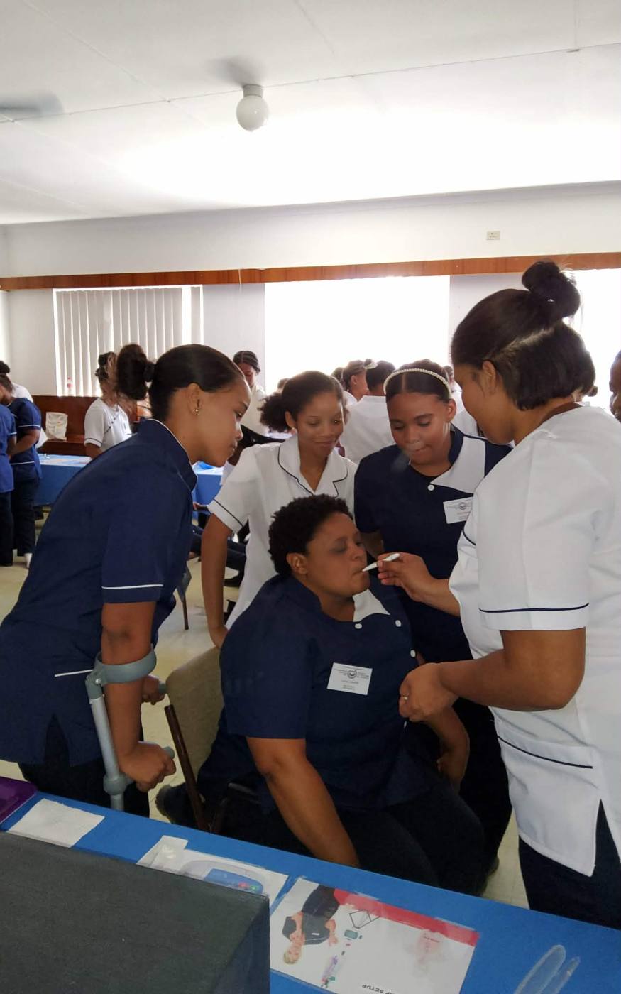 Students practising oral care technique